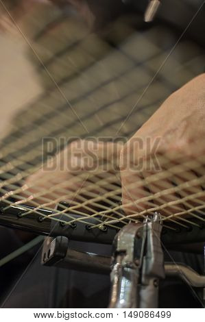 Detail Of Tennis Racket In The Stringing Machine