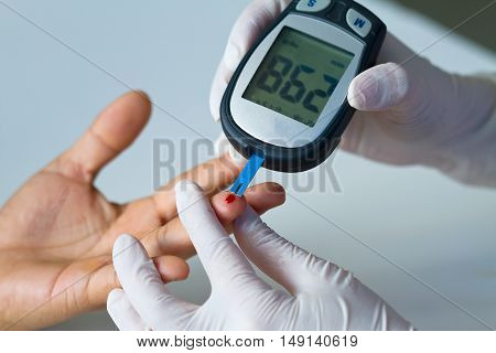 blood glucose meter, the blood sugar value is measured on a finge