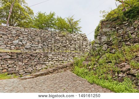 Stone walls (ishigaki) of Wakayama castle Japan. Castle was erected in 1585 bombed out in 1945 reconstructed in 1958