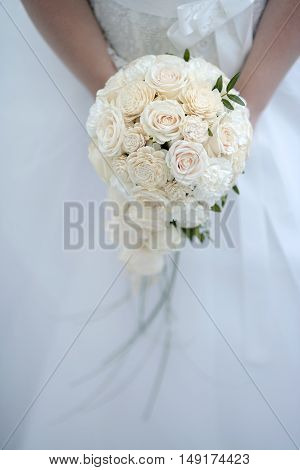 Beautiful Bride Is Holding A Wedding Colorful Bouquet. Beauty Of Colored Flowers. Close-up Bunch Of