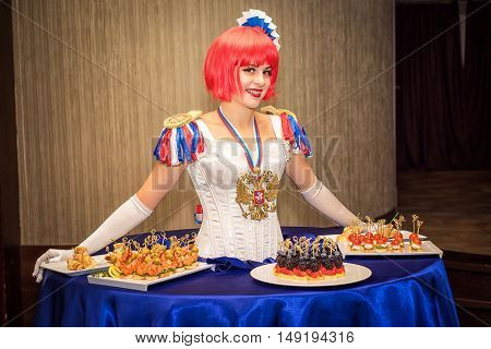 Moscow, Russia - September 18, 2016: Charming Lady Buffet, Who Dress Is Stylized Russian National Co