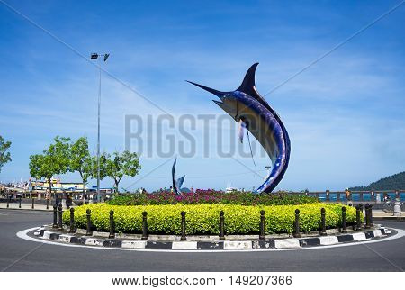 Kota Kinabalu, Malaysia - September 01, 2016: A Giant Swordfish Statue Stands In The Center Of A Rou
