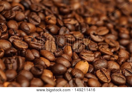 Closeup of brown coffee background. Macro photo of coffee beans