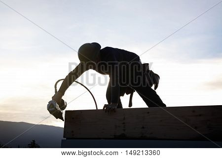 A carpenter working on a consruction site