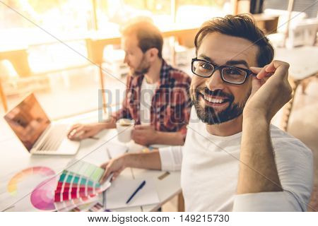 Handsome Designers Working