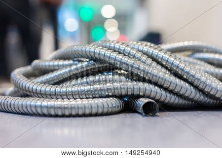 Flexible metal pipe on construction site .