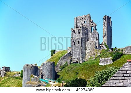 CORFE, UNITED KINGDOM - JULY 19, 2016 - View of Corfe castle on the hilltop Corfe Dorset England UK Western Europe, July 19, 2016.