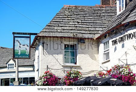 CORFE, UNITED KINGDOM - JULY 19, 2016 - Part of The Greyhound pub in the centre of the village Corfe Dorset England UK Western Europe, July 19, 2016.