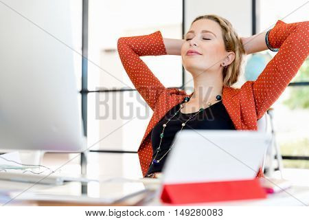Young woman in office