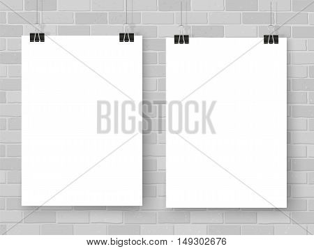Posters template on grey brick wall. Realistic wall gallery vector illustration. Set of colorful empty vector mockups for your illustrations drawings posters or photos.