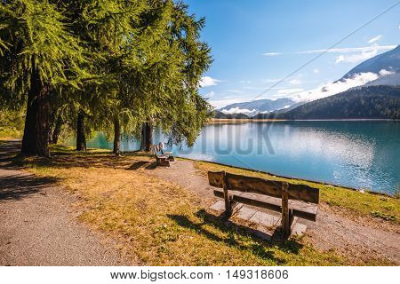 Great view of the azure pond Champfer in alpine valley. Popular tourist attraction. Picturesque and gorgeous scene. Location Swiss alps, Silvaplana village, district of Maloja, Europe. Beauty world.