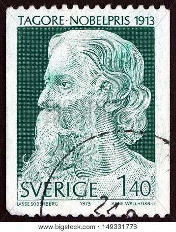 SWEDEN - CIRCA 1973: a stamp printed in Sweden shows Rabindranath Tagore Writer and Painter Winner of 1913 Nobel Prize circa 1973