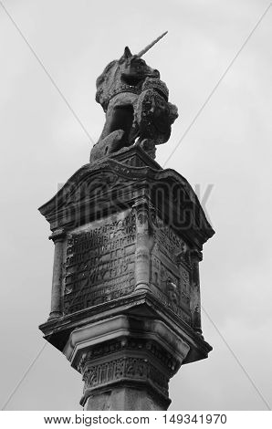 A view of the unicorn sculpture on top of the Mercat cross in Culross