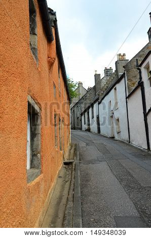 A view along a narrow residential street in the medieval village of Culross