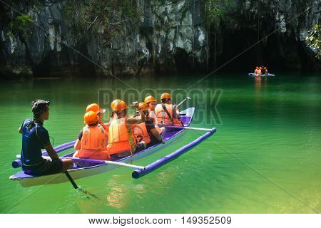  PALAWAN PHILIPPINES FEBRAURY 11 2016, Boats at cave entrance of Puerto Princesa subterranean underground river - One of the 7 New Wonders of Nature