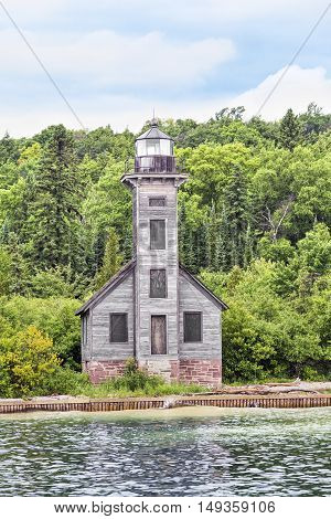 First lit in 1868 the Grand Island East Channel Lighthouse marks the way from Lake Superior to the port of Munising in Upper Peninsula of Michigan.