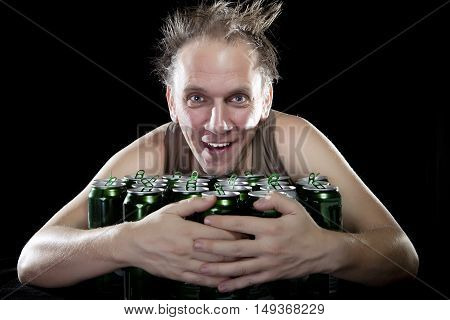 The happy tipsy man near empty beer jars
