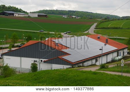 a house with solar photovoltaic panels photovoltaic