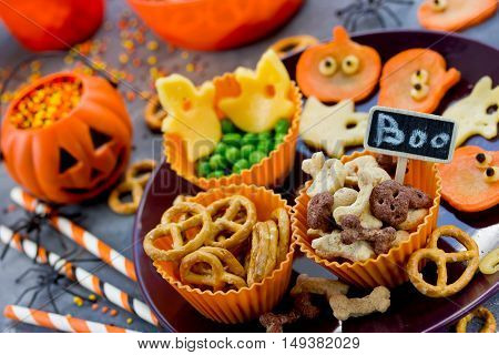 Various treats on Halloween party funny and healthy snacks for kids selective focus