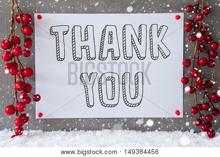 Label With English Text Thank You. Red Christmas Decoration On Snow. Urban And Modern Cement Wall As Background With Snowflakes.