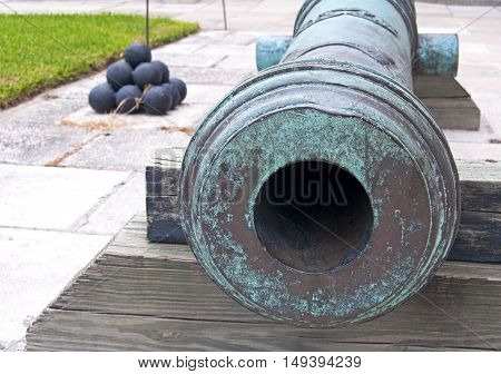 Old cannons in a fort, on an overcast day. Old Castillo de San Marcos, St. Augustine, Florida