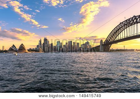 Sydney Harbour Bridge and Sydney Opera House NSW Australia at sunset. Sep 29,2016 the Sydney Opera House is one of the modern building, well known worldwide.Over 10 milions tourists visit Sydney a year.