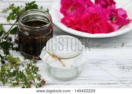 Alternative medicine remedy oil from curative herbs perfect for skin with essential oil from scented flowers
