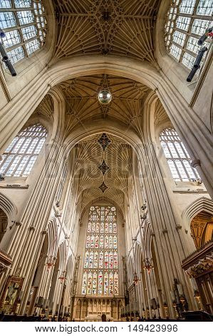 Bath UK - August 15 2015: Interior view of Bath Abbey. Symmetrical low angle view. The abbey is an Anglican parish church and an active place of worship