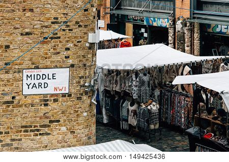 LONDON UK - AUGUST 20 2015: Camden Town Market famous alternative culture shops. Mainly tourist oriented selling souvenirs crafts and fashion products