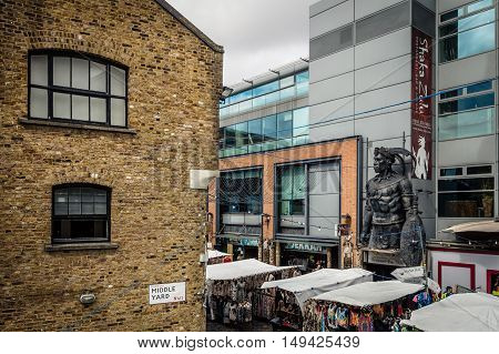 LONDON UK - AUGUST 20 2015: Camden Town Market famous alternative culture shops. Mainly tourist oriented selling souvenirs crafts and fashion products