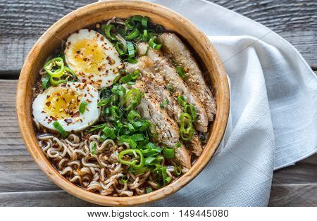 Bowl Of Chicken Ramen Soup On The Wooden Table