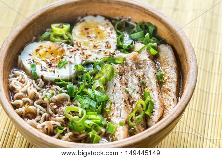 Bowl Of Chicken Ramen Soup On The Wooden Table