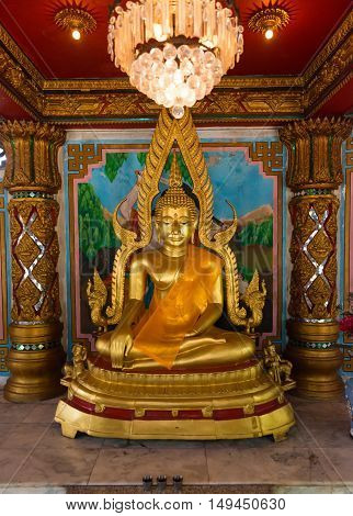 Golden Statue Of The Buddha Inside Li Thi Miew Shrine