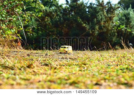 vintage toy car camper van outdoors nature background