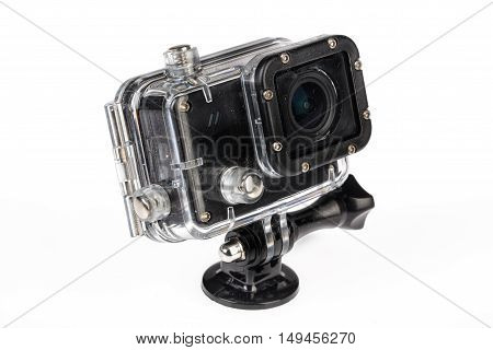 Action camera in a waterbox on an isolated studio background