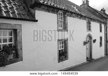 An external view of old residential buildings in the medieval village of Culross