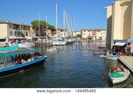 Port Grimaud, Provence, France - August 23 2016: Various Boats Available To Hire In This Pretty Fren