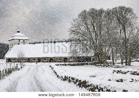 View of a snow covered Hovdala Castle in Hassleholm region. Hovdala Castle is a castle in Hassleholm Municipality Scania in southern Sweden.