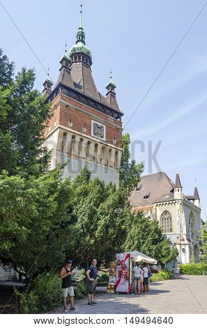 BUDAPEST, AUGUST 9: Tourists enjoying the beautiful weather visit Vajdahunjad Castle on August 9, 2015 in Budapest, Hungary. Vajdahunyad Castle is located in the City Park.