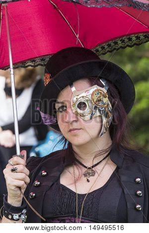 CAGLIARI, ITALY - June 1, 2014: Sunday at La Grande Jatte public gardens - Sardinia - portrait of a woman in steampunk costumes