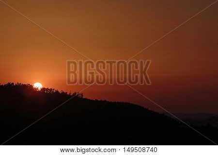 Autumn red sunset over mountains Cinfaes Portugal