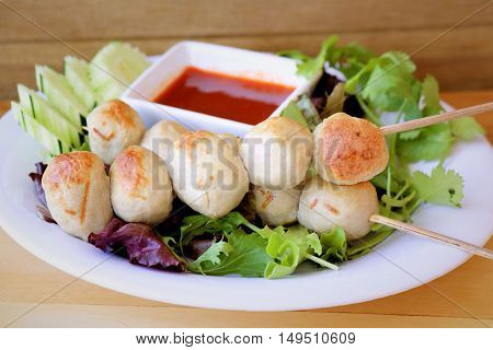 Grill pork ball with cucumber, green salad with sweet chili sauce