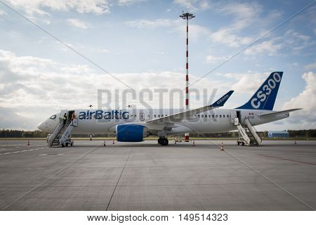 RIGA - SEPTEMBER 27: airBaltic new Bombardier CSeries passenger jet on display at Riga Airport - September 27, 2016 in Riga, Latvia