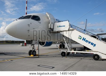 RIGA - SEPTEMBER 27: airBaltic new Bombardier CSeries passenger jet on display at Riga Airport - September 27, 2016 in Riga, Latvia