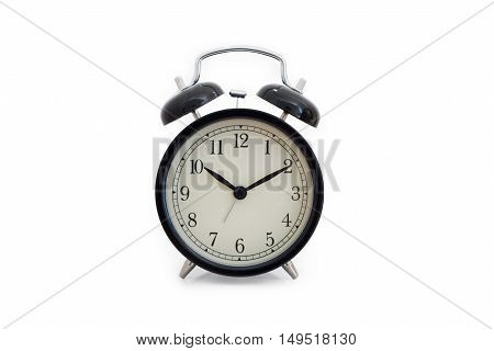 A black alarm clock on white background