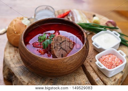 Traditional Ukrainian Russian Vegetable Soup, Borsch With Garlic Donuts, Pampushki On A White Wooden