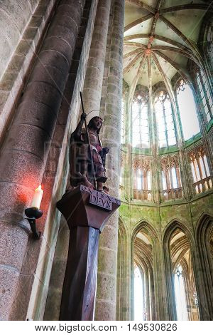 Mont Saint Michel France - September 8 2016 Benedictine Abbey of Mont Saint-Michel in Normandy Archangel Michael with scales and sword