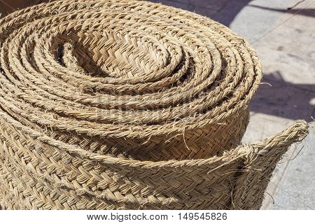 Folded carpet made of esparto fibers. Closeup