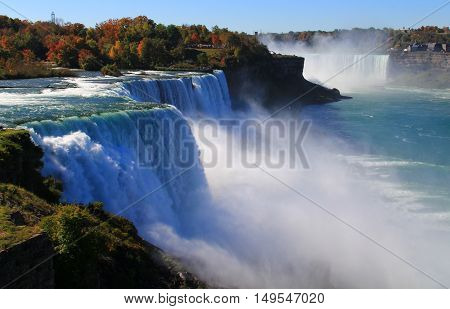 Niagara Falls from USA. Landscape view. Niagara Falls is the collective name for three waterfalls that straddle the international border between Canada and the United States.