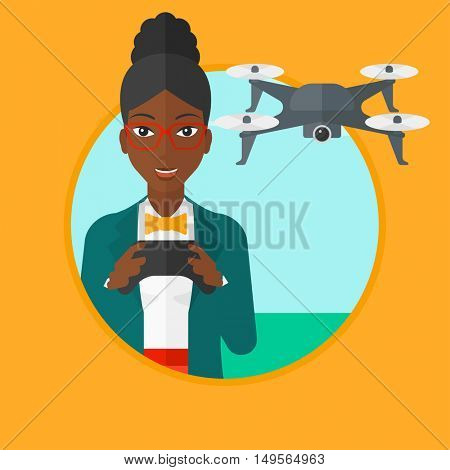 An african-american woman flying drone with remote control. Woman operating a drone with remote control. Woman controling a drone. Vector flat design illustration in the circle isolated on background.